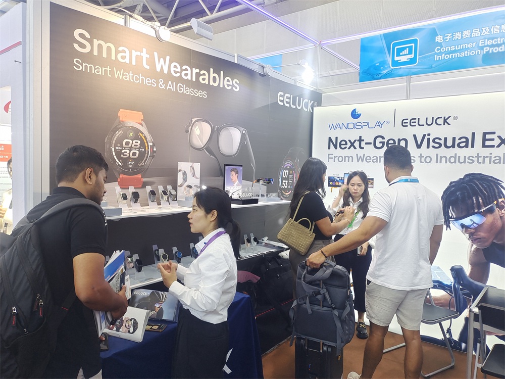 international buyers testing smart watches at EELUCK booth Canton Fair 2026